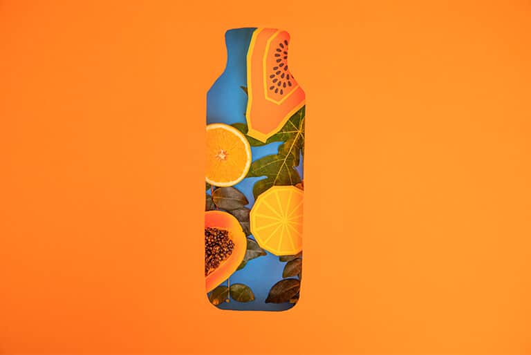 imagem representando suco de laranja com mamão, rico em vitamina A